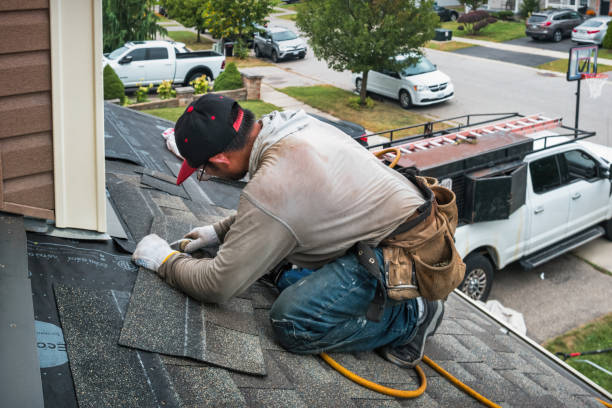 Professional Roof Installation technician working in Husum, WA